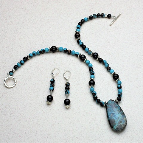 shattuckite focal pendant paired w/ serpentine/bronzite & bronzite beads, silver beads accents, finished w/ a sterling toggle clasp (#800)  coordinating earrings on sterling leverbacks (#800E) 
