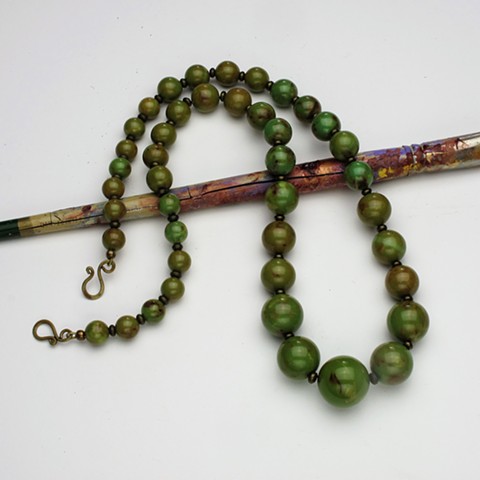 vintage chic: rare mottled green graduated vintage Bakelite beads accented with brass spacers and finished with a brass clasp, 28" (#103)
