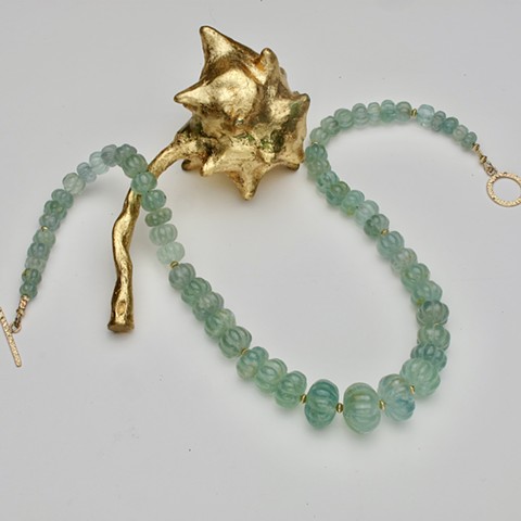 graduated carved aquamarine #971