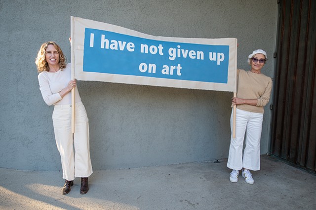 image of banner from Mid-Pandemic March