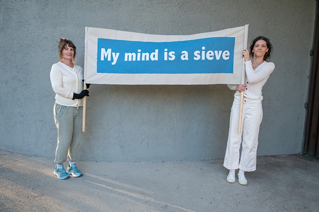 image of banner from Mid-Pandemic March