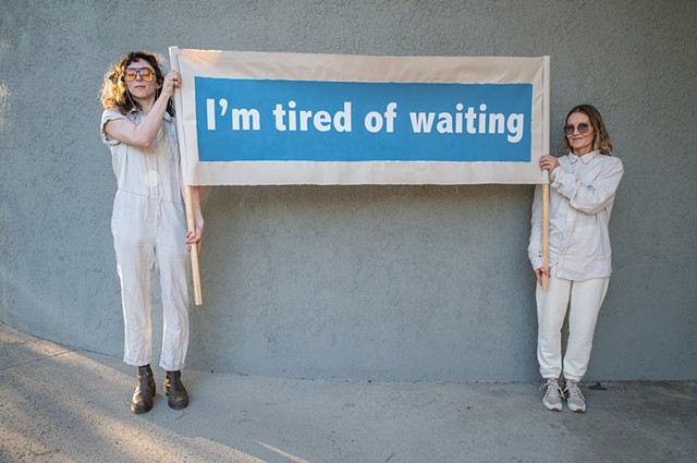 image of banner from Mid-Pandemic March