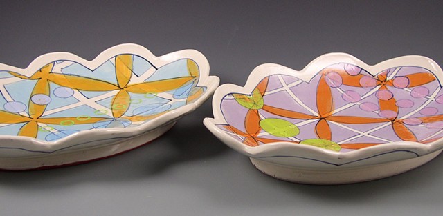 oval platter, medium, handbuilt with handpainted underglaze decoration, blue grid, orange flowers, geometric, modern
