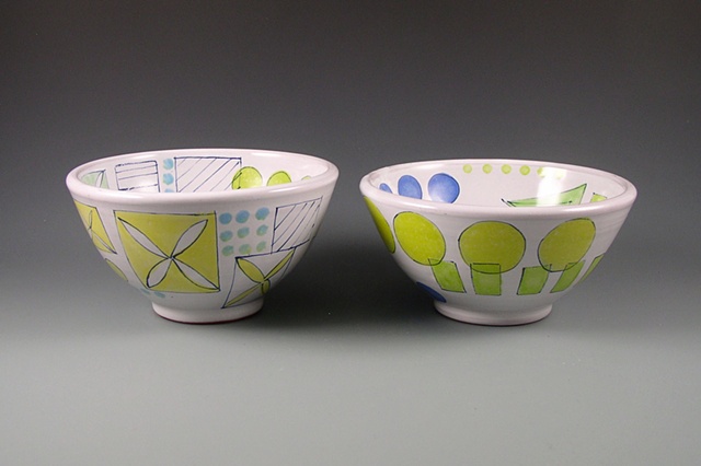 two thrown earthenware bowls with handpainted majolica glaze