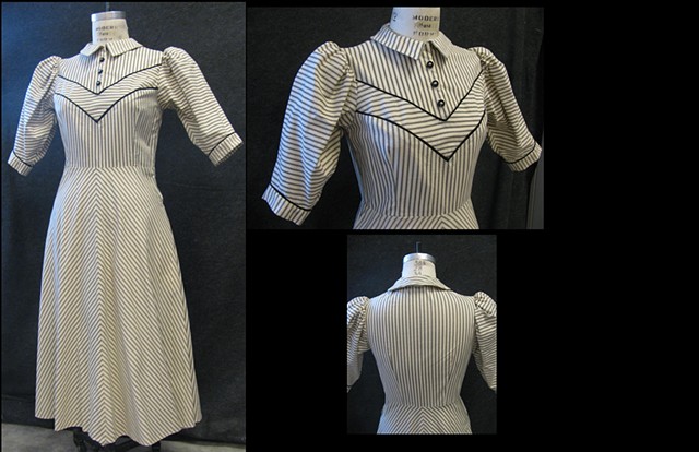 1940s STRIPED DAY DRESS

Striped shirt dress with yoked, fitted bodice, A-line skirt and Peter Pan collar. Elbow-length puffed sleeves with netting header.  Piping trim and various chevroned striped treatments.  Front button placket in yoke and side zippe