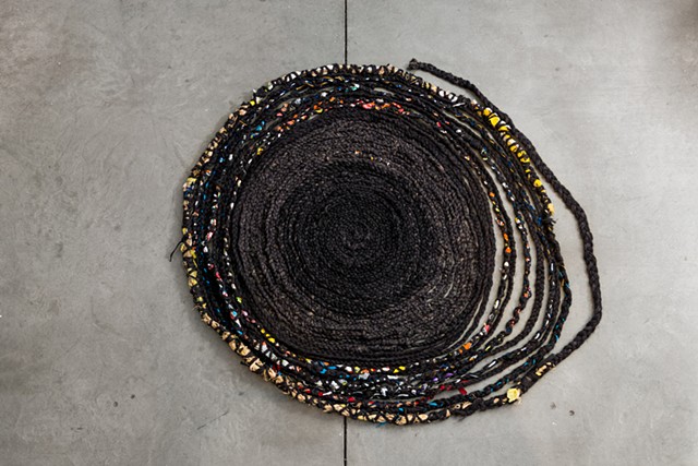 Braided, handmade rope made from materials collected at Humboldt Park; 