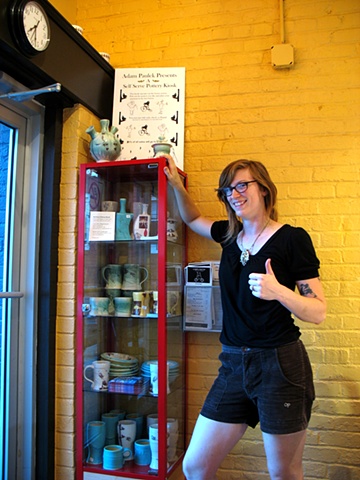 Noell, an owner of the Lamplighter Coffee Shop with a Self Serve Pottery Kiosk