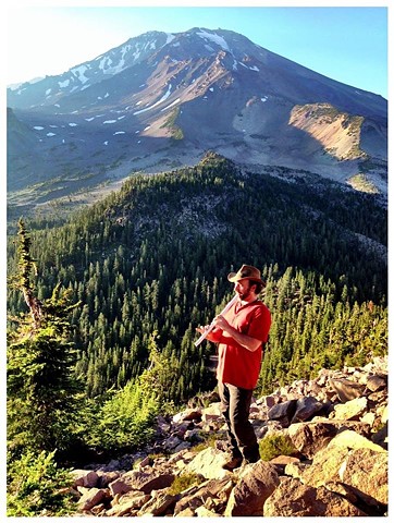 playing shakuhachi flute and hiking Mount Shasta, California
