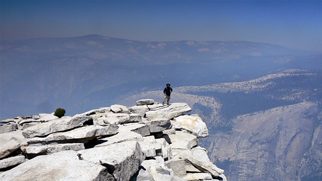 on the peak of Half Dome,
climbed up the sheer, nearly vertical ascent to make it to the plateau.
Yosemite National Park