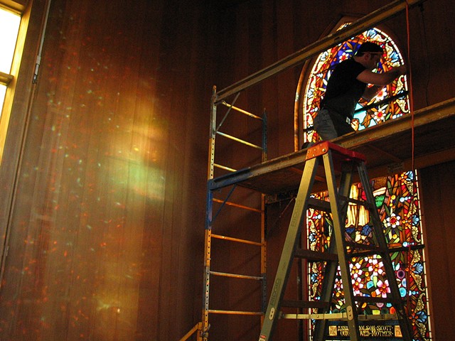 installing restored window for Saint John's Presbyterian church, San Francisco CA