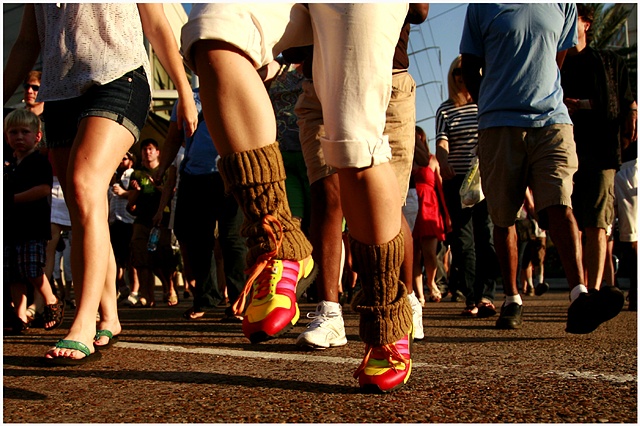  Elsie Semmes‘ colorful shoes stand out amongst the sea of feet as the second line begins. 