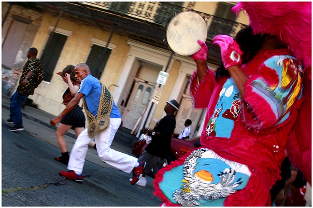 Darryl Young dances down Rampart as Honey plays his tambourine, during a second line celebrating and honoring the grand opening of The New Orleans Healing Center. The second line traveled down Rampart to the New Orleans Healing Center with their arrival k