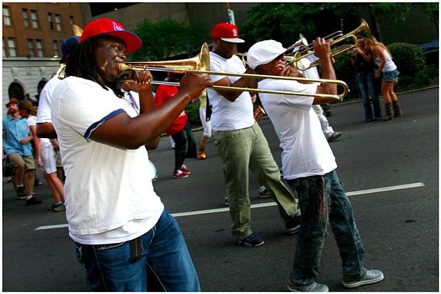 Members of Rebirth Brass Band lead a second line through New Orleans on the 6th Anniversary of Katrina ending with the unveiling of a memorial at the Sartatoga Building.