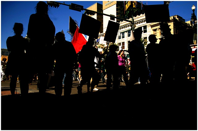 Hundreds of protestors gathered at Duncan Plaza to march in New Orleans in support of, and in conjunction with, the Occupy Wall St. movement which started in New York. The march made its way through the French Quarter ending outside of the Federal Reserve