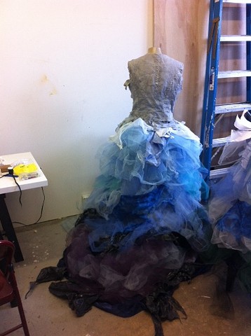 Making the hoop skirts in the studio. 