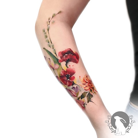 Watercolor flower bouquet tattoo