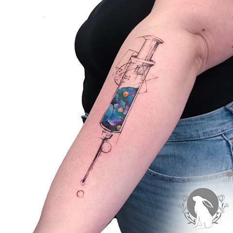 geometric color vaccine tattoo