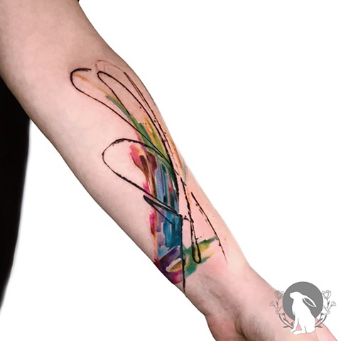 Bright color geometric abstract tattoo