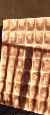 dished panel in bronze finish / on 
the terrace / catching the sunset