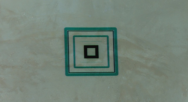 light deposit / nested squares on smooth plaster