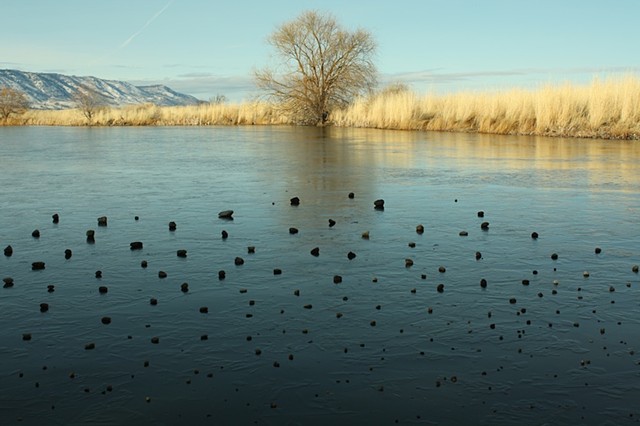 arrangement of stones on 25x40' area of pond ice with view-finder. Summer Lake, Or. 2012. Archival ink jet print, 14x18"