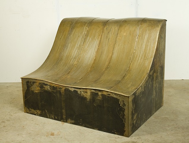 Like the side of a rolling valley, this sculpture invites the viewer to sit and relax. View in the studio.