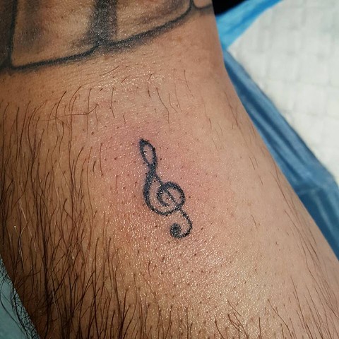 handpoked treble clef tattoo, music, music note
