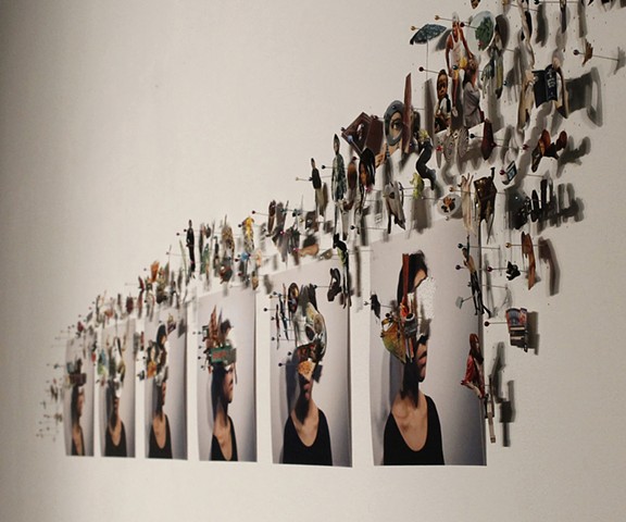 Three dimensional collage pinned directly to the wall