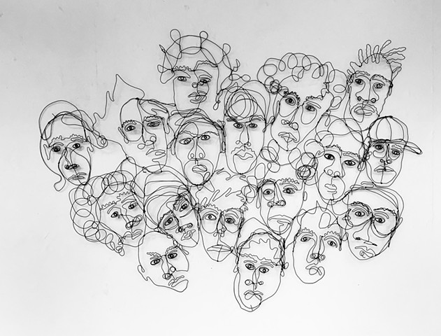 AN ASSEMBLY OF HEADS