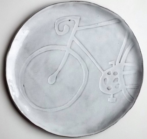 dinner plate with bike relief