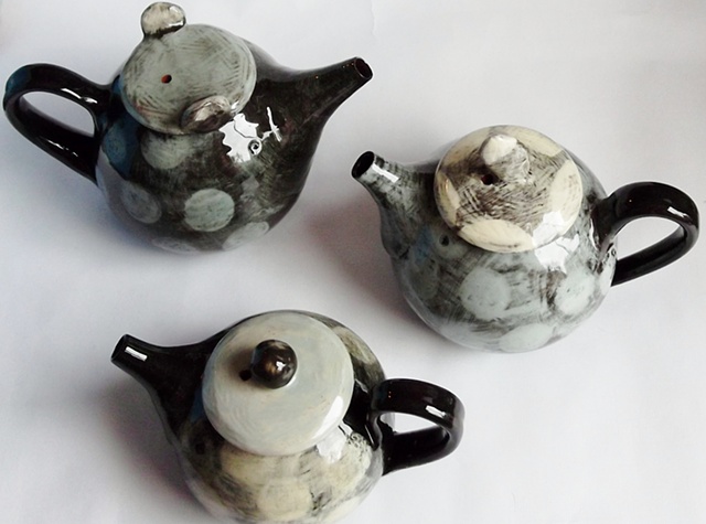 Black and white teapots
