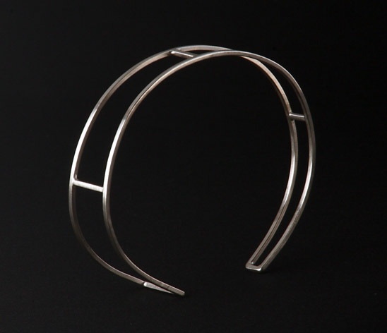bracelet with clean architectural lines.