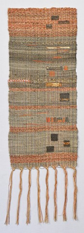 handspun wool and silk weft; cotton warp; woven on 12 harness loom with supplemental warp