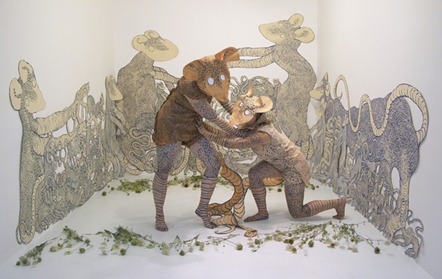 Installation and performance by Zehra Khan at Gallery Ehva in Provincetown. #Zehra Khan #installation #performance #costume #photograph #animal #beast #bodypainting #art #rats #mask #painting #zehrakhan #contemporaryart #paperinstallation #paperworld #mix