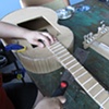 Dismantling Guitar