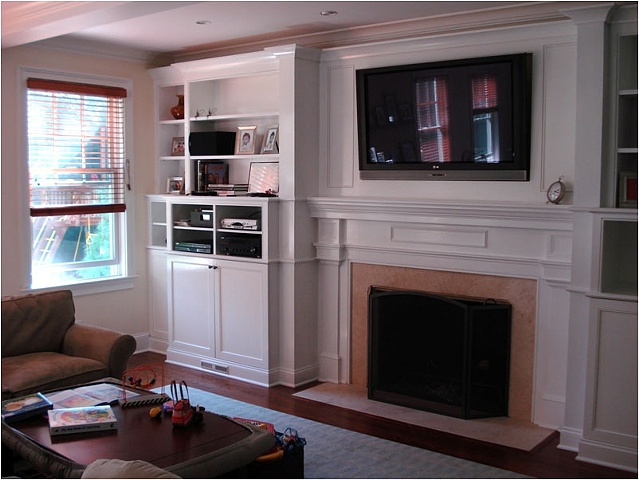 Built-in wall-unit, entertainment center and fire surround. 