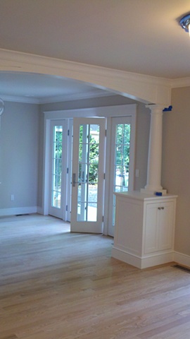Millwork and decorative column created using FSC certified materials for LEED project.