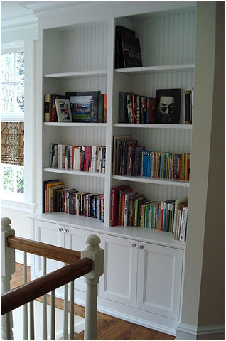 Bookcase cabinet with wainscot.