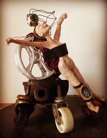 Ceramics and Mixed Media Sculpture of a lady with wheels 