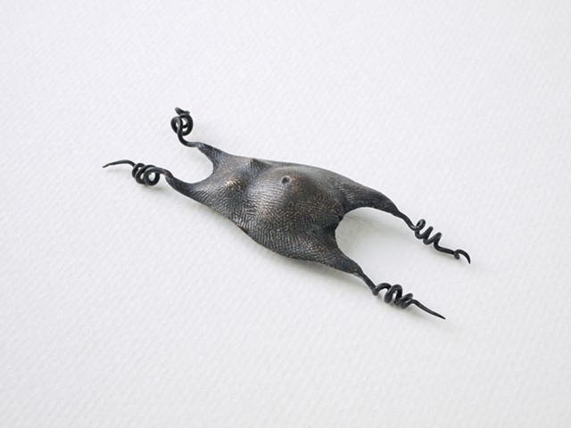mermaid’s purse (deity figure)      