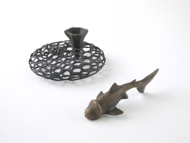 lachrymal vessel with stand & phallic talisman     