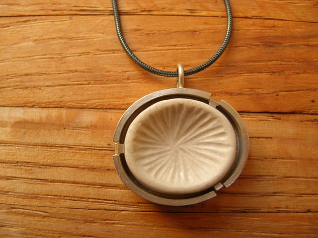 carved porcelain necklace