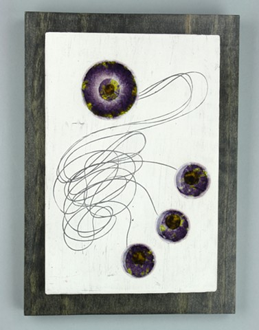 Wall art tile made from clay with fused purple yellow glass