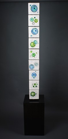 Interactive Totem Made of clay, glass, iron wash, wood, steel
