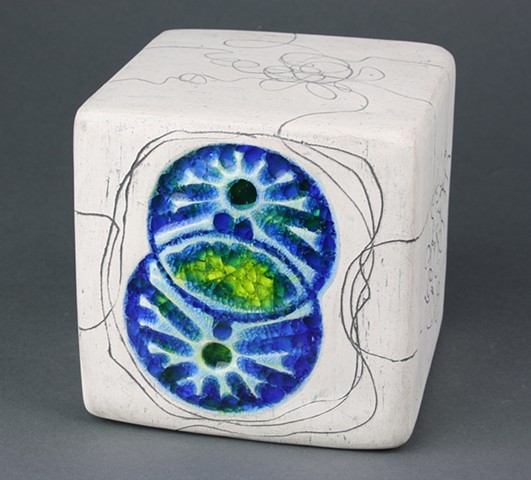 Ceramic cube with fused glass