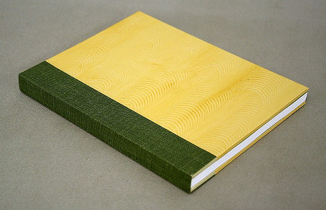 Double fan adhesive binding - yellow paste paper