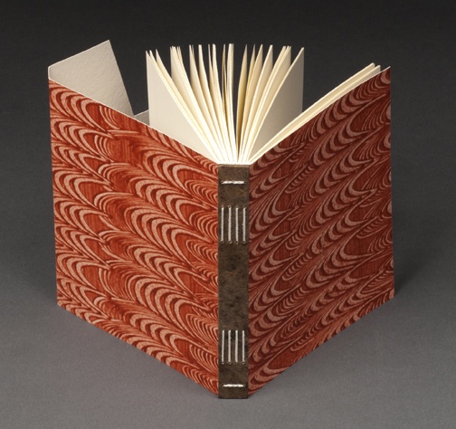 Long Link Stitch Binding with Spine Stiffener and Pastepaper Cover