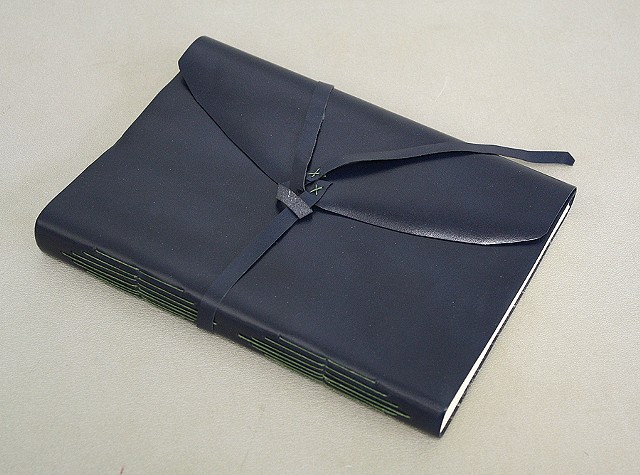 Navy leather longtitch binding