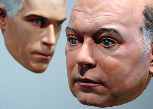 sculpted painted portraits of Larry Walczak and Matthew Freedman