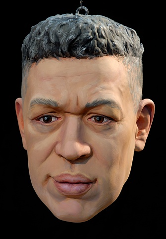 sculpted painted portrait of Andres Serrano